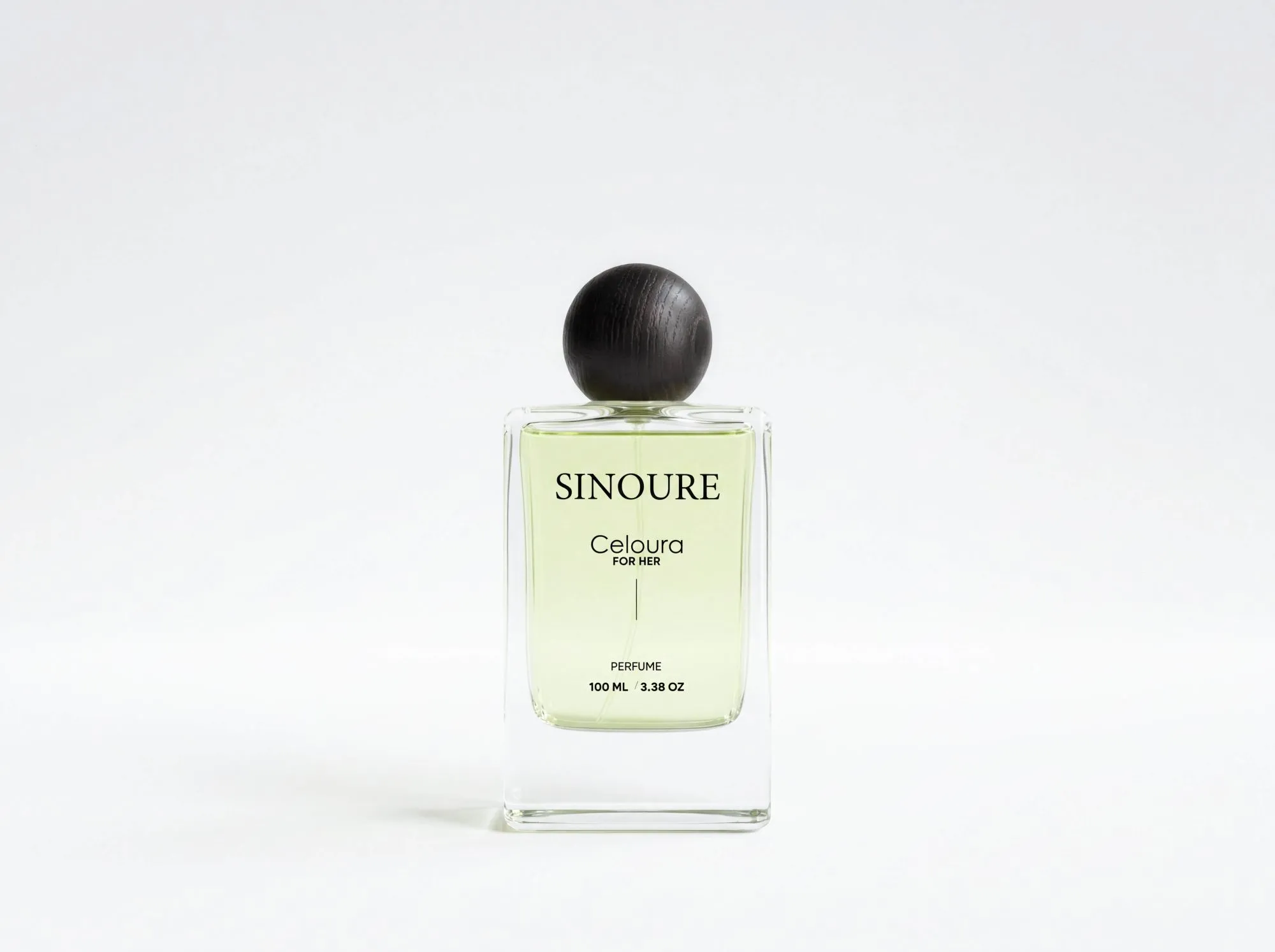 SINOURE Celoura For Her perfume bottle with pale green fragrance on a white background