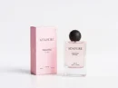 SINOURE Nexoria For Her perfume bottle and pink packaging box on a white background