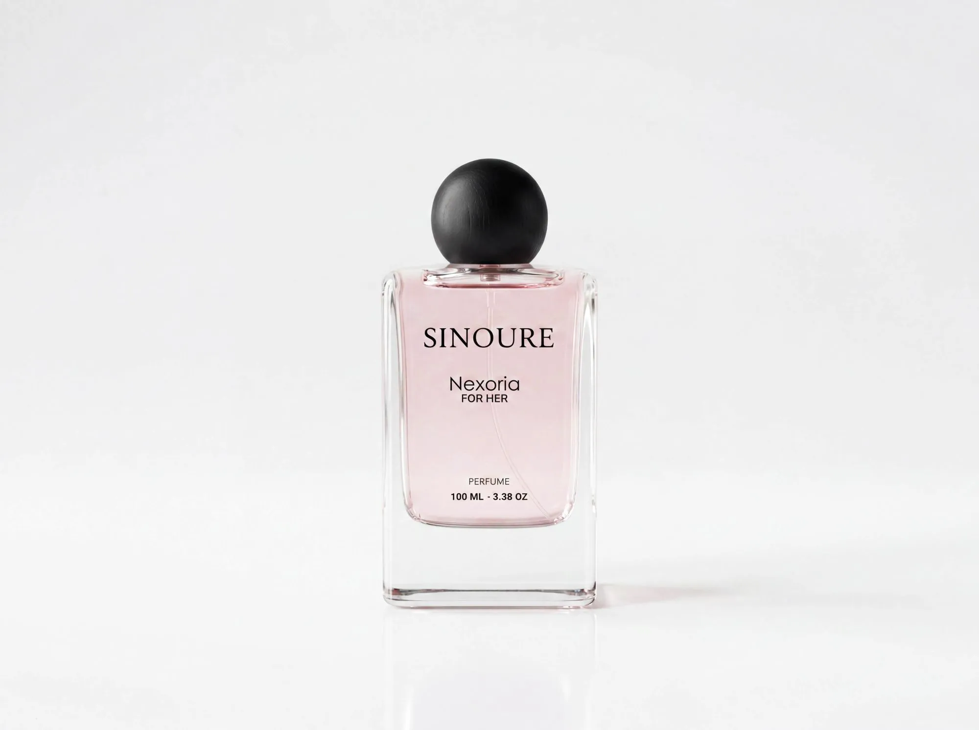 SINOURE Nexoria For Her pink perfume in a clear bottle on a white background
